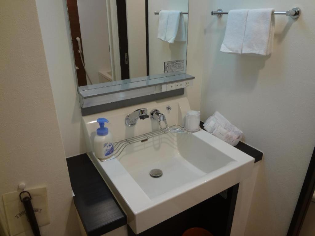 Hotel New Takada Токио Номер фото